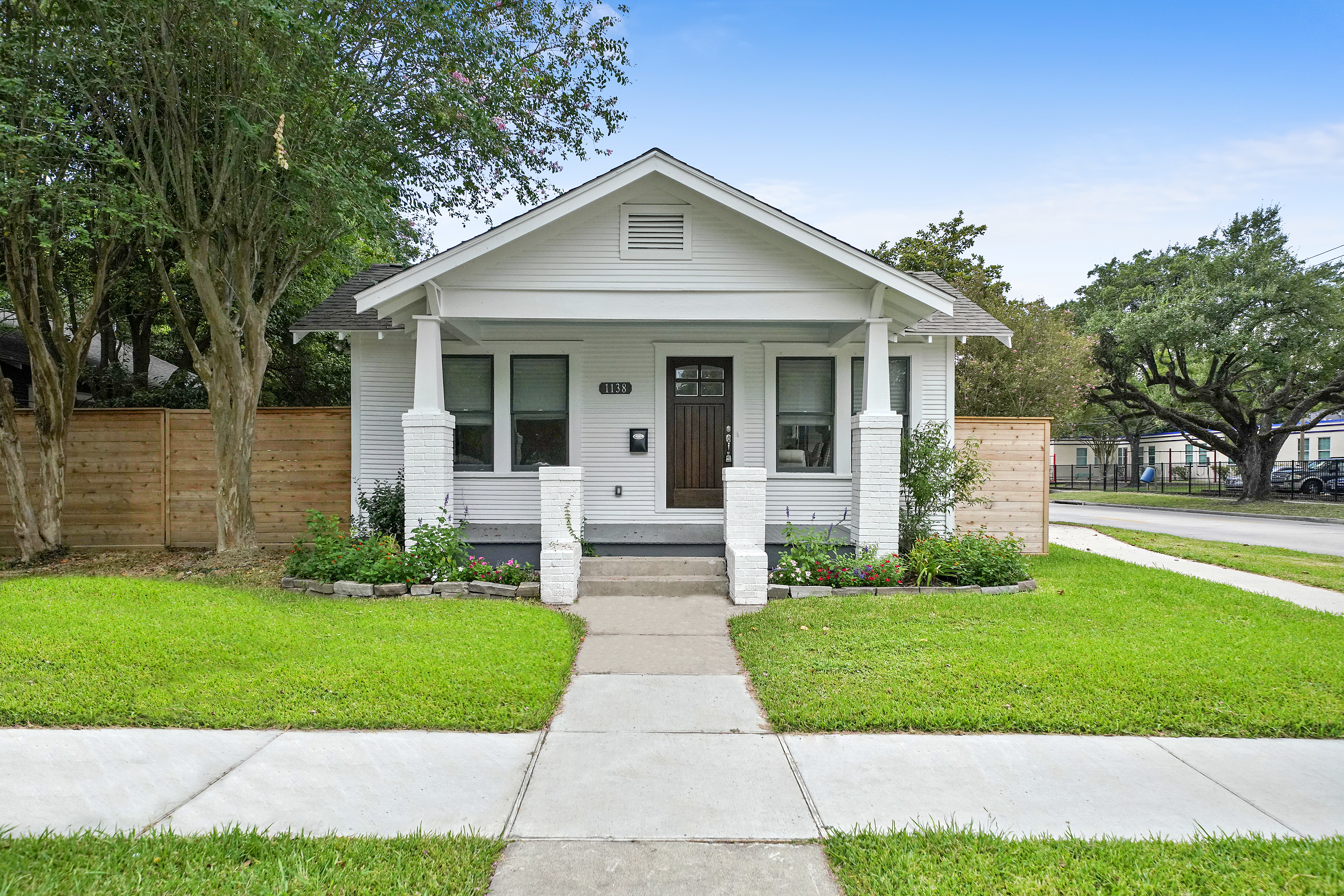 Buying Houston Real Estate - A White One Story Bungalow